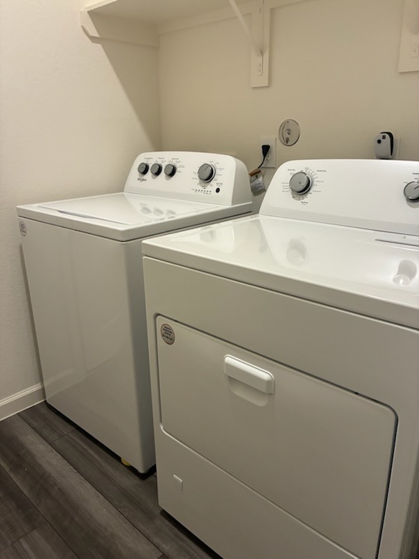 Cleaned washer and dryer in a laundry room